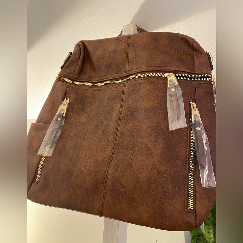 Brown leather-look backpack